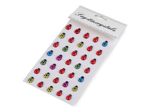 Selbstklebende Marienkäfer auf Klebestreifen